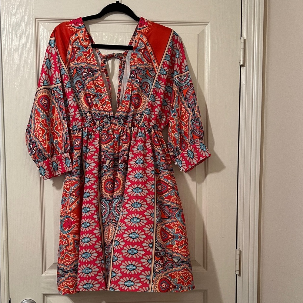 Vibrant Patterned Dress with Red and Blue Accents